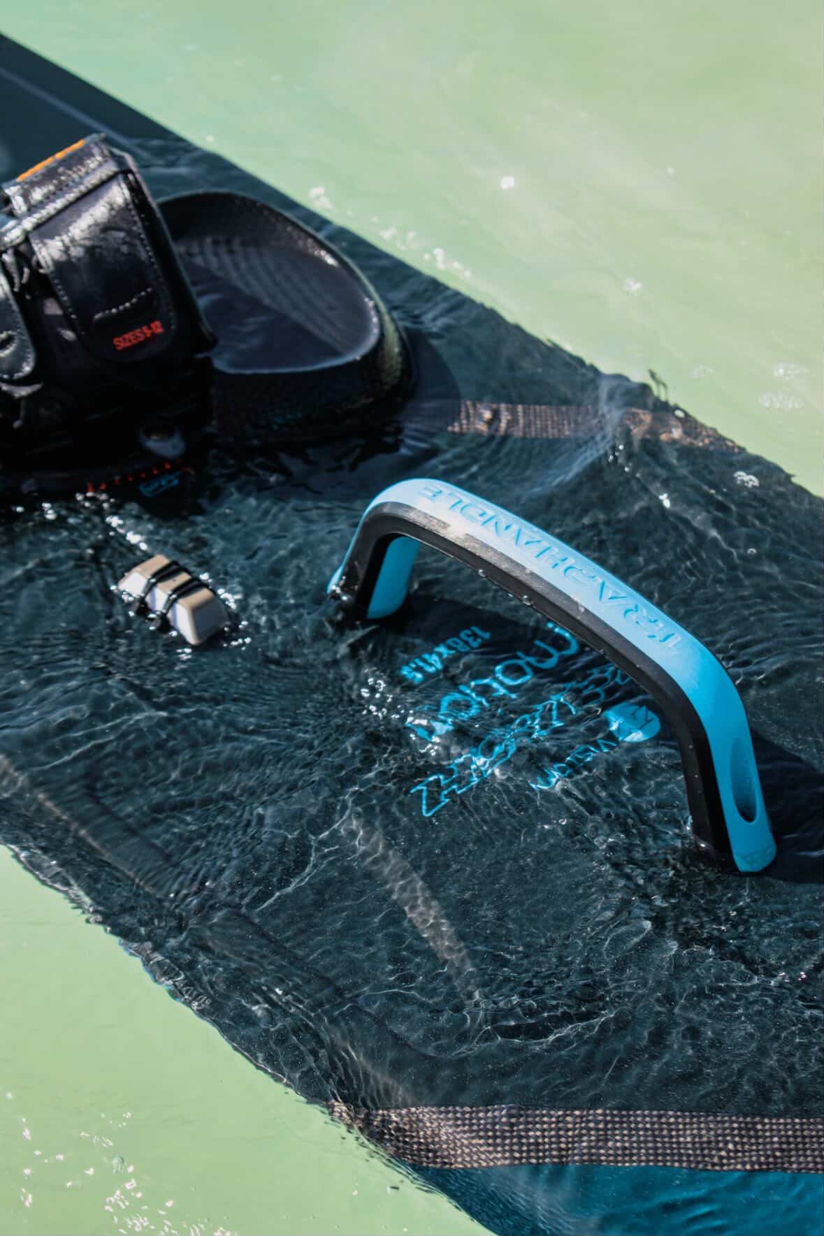 Trap Handle kiteboard handle mounted on a board in the water